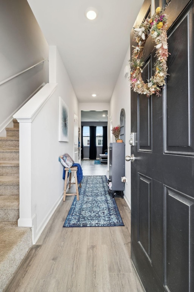7401 Brady Ln, Antioch, TN 37013 - foyer featuring stairway, wood finished floors, baseboards, and recessed lighting