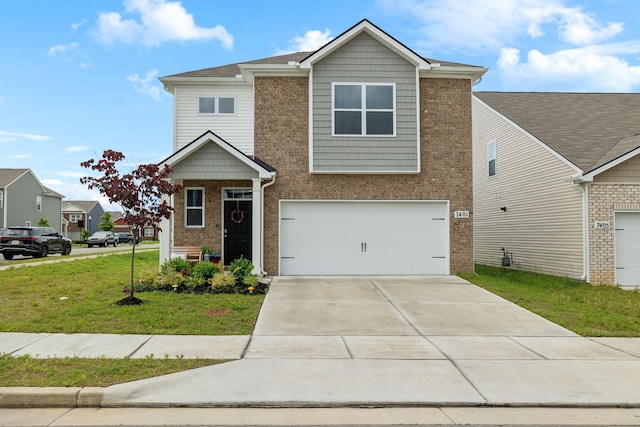7401 Brady Ln, Antioch, TN 37013 - view of front of property featuring a garage, a front lawn, driveway, and brick siding