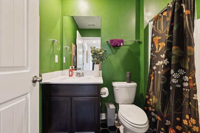 7401 Brady Ln, Antioch, TN 37013 - full bathroom with toilet, vanity, and a shower with curtain