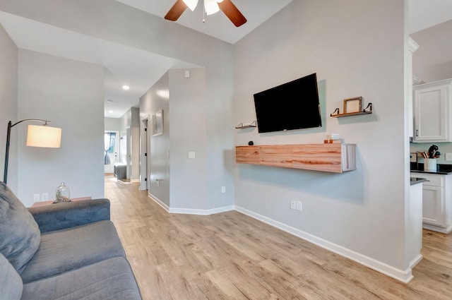 517 Main St, Burns, TN 37029 - living room with ceiling fan, light wood finished floors, baseboards, and recessed lighting