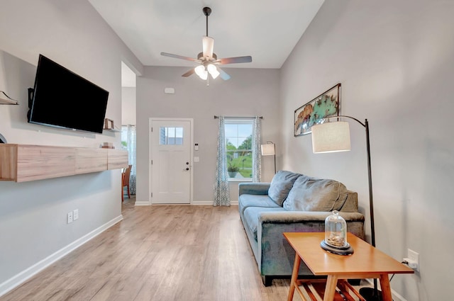 517 Main St, Burns, TN 37029 - living room with a ceiling fan, light wood finished floors, and baseboards