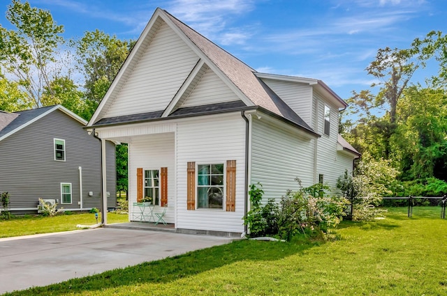 517 Main St, Burns, TN 37029 - view of side of property with a patio and a shingled roof
