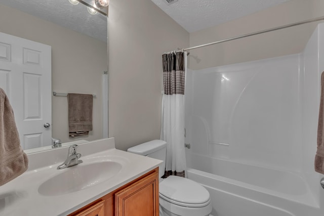full bath featuring toilet, a textured ceiling, shower / tub combo with curtain, and vanity