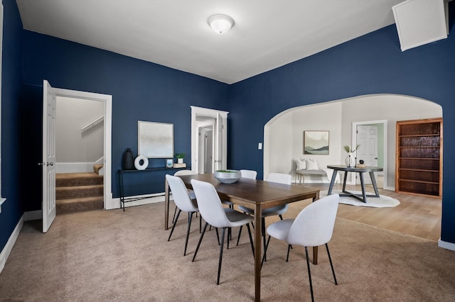 2001 E 16th St, Chattanooga, TN 37404 - carpeted dining area featuring arched walkways and stairway