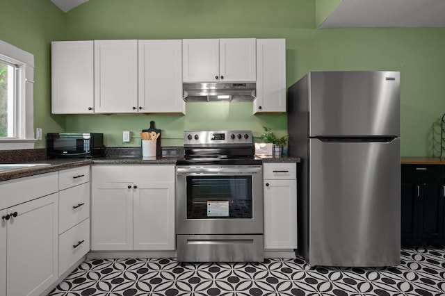 2001 E 16th St, Chattanooga, TN 37404 - kitchen featuring appliances with stainless steel finishes, under cabinet range hood, and white cabinets