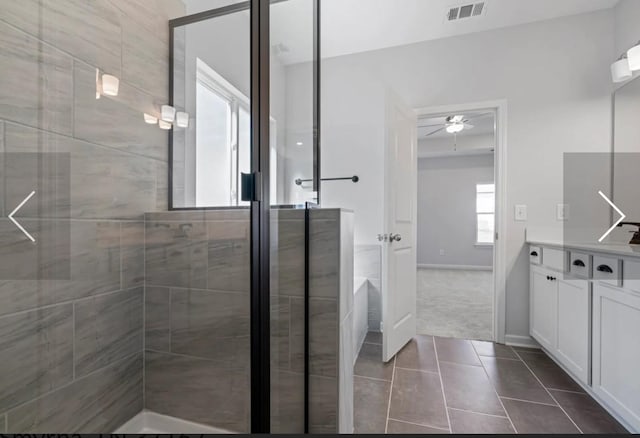 6152 Worthingtion, Columbia, TN 38401 - bathroom with tile patterned floors, a stall shower, vanity, ceiling fan, and baseboards
