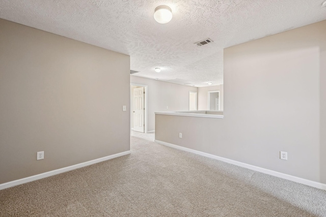 107 Owl Dr, Lebanon, TN 37087 - carpeted empty room featuring a textured ceiling and baseboards