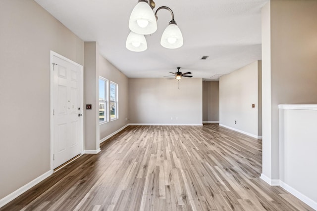 107 Owl Dr, Lebanon, TN 37087 - unfurnished living room with light wood finished floors, ceiling fan, and baseboards