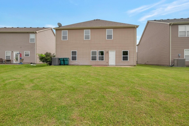 107 Owl Dr, Lebanon, TN 37087 - back of property featuring a lawn and central AC