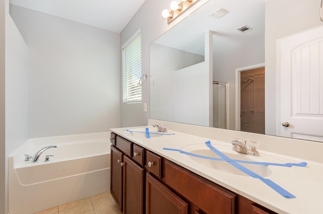 8007 Timber Cove Dr, Mount Juliet, TN 37122 - bathroom with a garden tub, double vanity, an enclosed shower, tile patterned floors, and a spacious closet