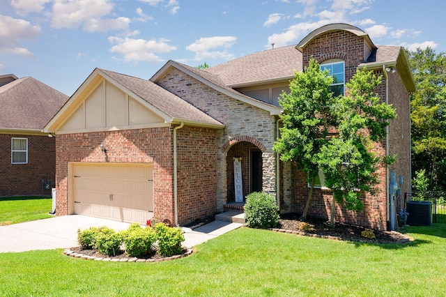 8007 Timber Cove Dr, Mount Juliet, TN 37122 - traditional-style home with an attached garage, a front lawn, concrete driveway, and cooling unit