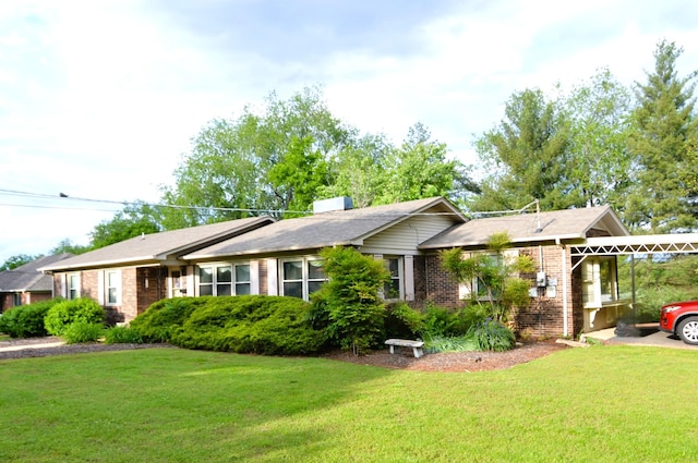 1210 Stewart Dr, Pulaski, TN 38478 - single story home featuring brick siding, a front lawn, a chimney, and a carport