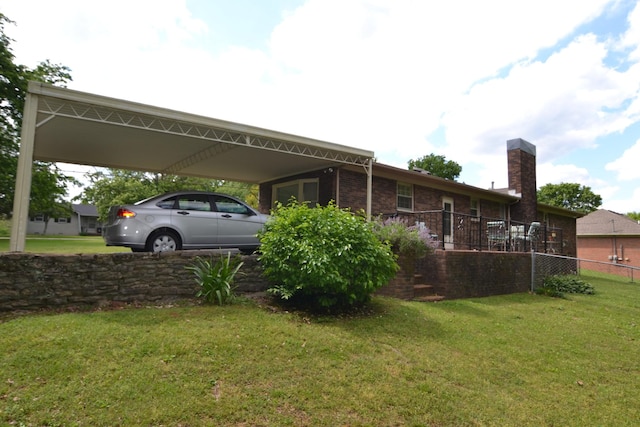 1210 Stewart Dr, Pulaski, TN 38478 - view of vehicle parking with an attached carport