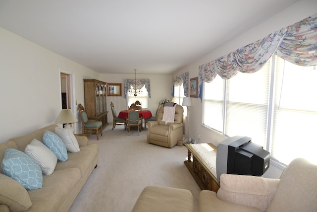1210 Stewart Dr, Pulaski, TN 38478 - living area with a chandelier and light carpet