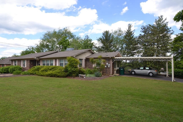 1210 Stewart Dr, Pulaski, TN 38478 - ranch-style house featuring a front lawn, a carport, asphalt driveway, and brick siding