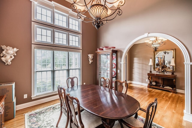 131 Grandview Cir, Gallatin, TN 37066 - dining space featuring a chandelier, plenty of natural light, light wood-style floors, and a high ceiling