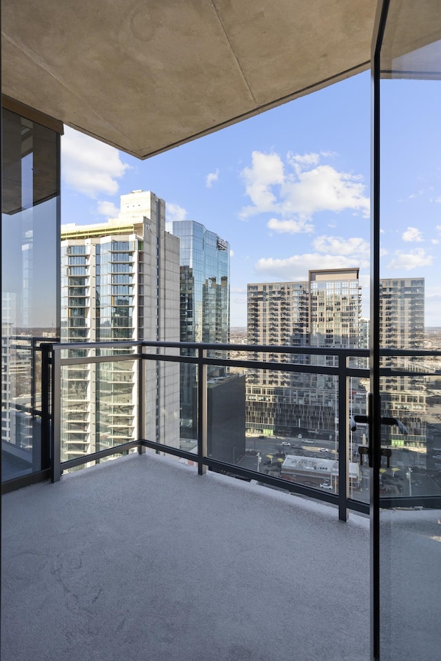 balcony featuring a city view