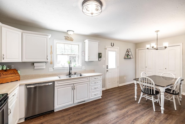 kitchen with stainless steel dishwasher, a sink, a chandelier, white cabinets, and dark wood-type flooring