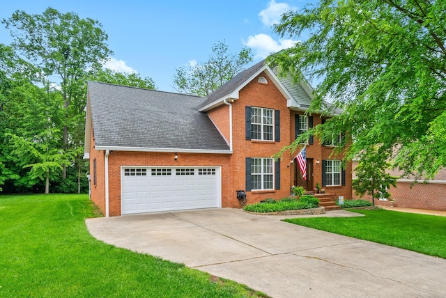 331 Bayhill Dr, Gallatin, TN 37066 - view of front facade featuring brick siding, an attached garage, concrete driveway, a front yard, and roof with shingles