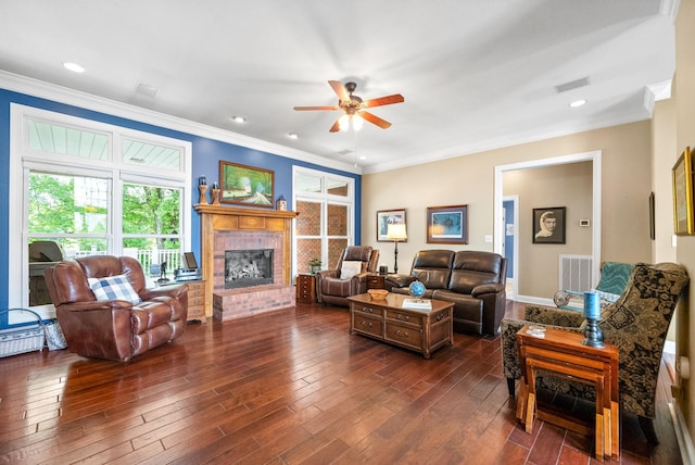 411 Lake Pointe Dr, Clarksville, TN 37043 - living room featuring crown molding, a ceiling fan, a brick fireplace, dark wood-style flooring, and recessed lighting