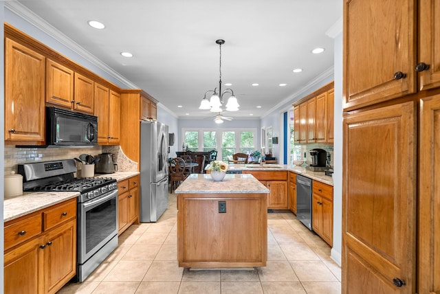 411 Lake Pointe Dr, Clarksville, TN 37043 - kitchen featuring stainless steel appliances, a chandelier, recessed lighting, ornamental molding, and a sink