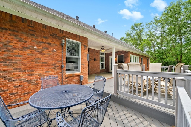 411 Lake Pointe Dr, Clarksville, TN 37043 - deck with outdoor dining area and a ceiling fan