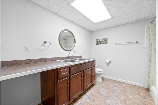 411 Lake Pointe Dr, Clarksville, TN 37043 - bathroom featuring vanity, a drop ceiling, and toilet