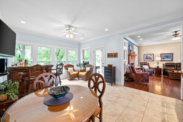 411 Lake Pointe Dr, Clarksville, TN 37043 - dining room featuring ceiling fan, plenty of natural light, recessed lighting, light tile patterned flooring, and ornamental molding