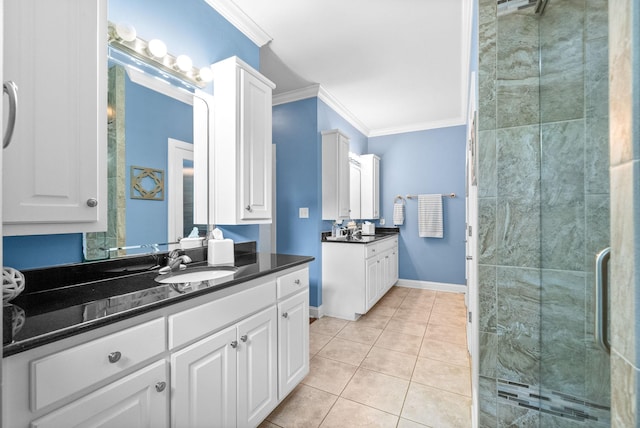 411 Lake Pointe Dr, Clarksville, TN 37043 - full bath with crown molding, a shower stall, tile patterned floors, two vanities, and baseboards