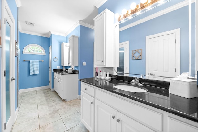 411 Lake Pointe Dr, Clarksville, TN 37043 - full bathroom with two vanities, crown molding, tile patterned floors, and baseboards