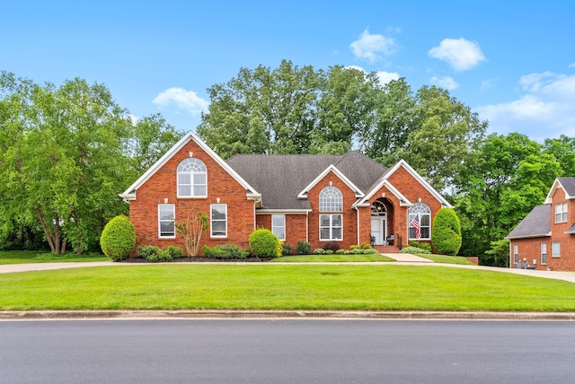 411 Lake Pointe Dr, Clarksville, TN 37043 - view of front facade featuring a front lawn and brick siding