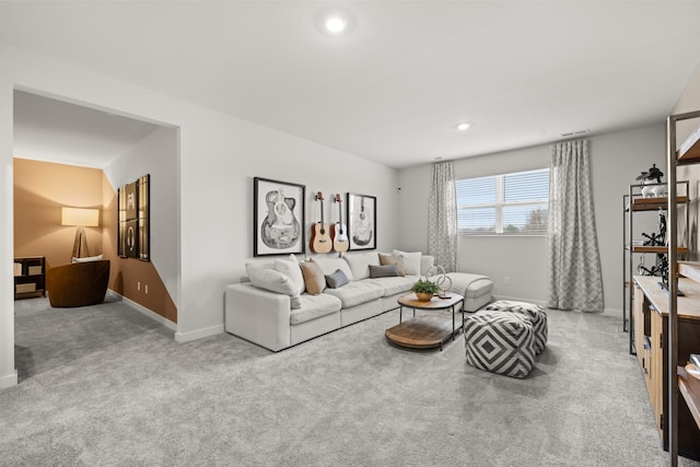 carpeted living room with baseboards and recessed lighting