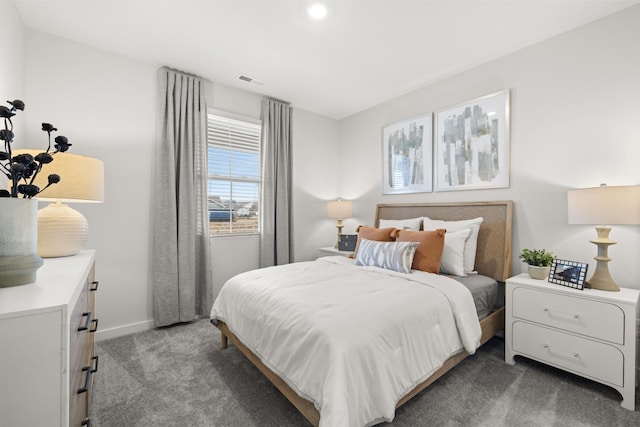 bedroom featuring carpet floors, baseboards, and recessed lighting