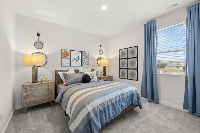 carpeted bedroom with baseboards