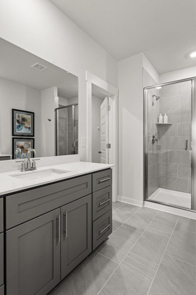 full bath featuring a shower stall and vanity