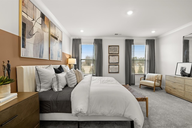 carpeted bedroom featuring crown molding, multiple windows, and recessed lighting