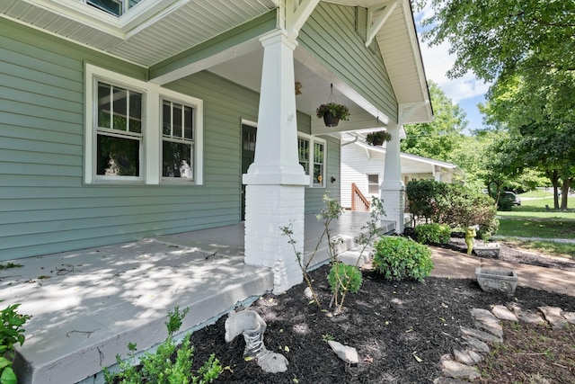 view of property exterior featuring a porch