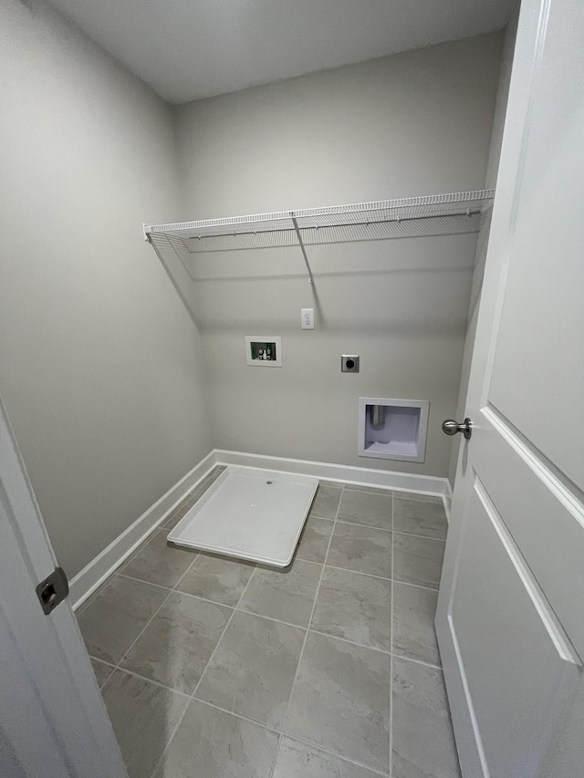 1085 June Wilde Rdg, Spring Hill, TN 37174 - laundry room with hookup for an electric dryer, washer hookup, and baseboards