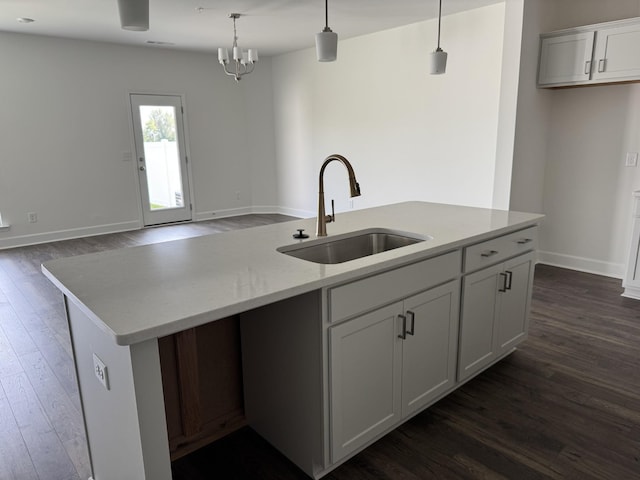 1085 June Wilde Rdg, Spring Hill, TN 37174 - kitchen featuring a sink, dark wood-style flooring, open floor plan, an island with sink, and decorative light fixtures