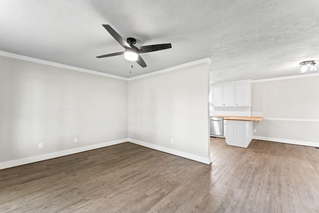 1950 Norton Rd, Lawrenceburg, TN 38464 - unfurnished room featuring ceiling fan, wood finished floors, ornamental molding, baseboards, and a textured ceiling