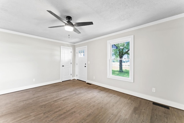 1950 Norton Rd, Lawrenceburg, TN 38464 - empty room featuring wood finished floors, ceiling fan, baseboards, ornamental molding, and a textured ceiling