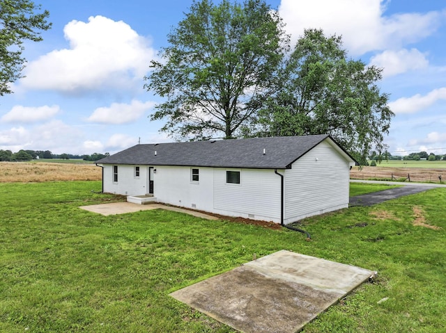 1950 Norton Rd, Lawrenceburg, TN 38464 - rear view of house featuring a patio area, crawl space, a yard, and a shingled roof