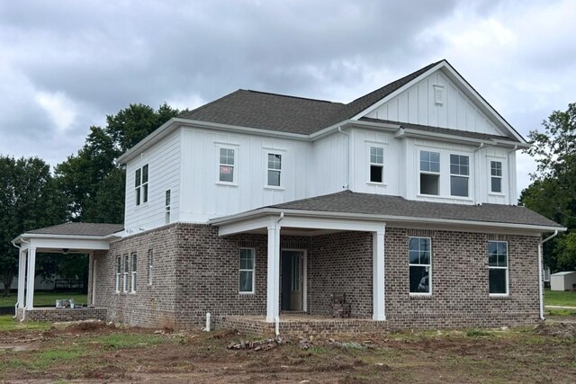 6161 Worthingtion Rd, Columbia, TN 38401 - back of house with board and batten siding and brick siding