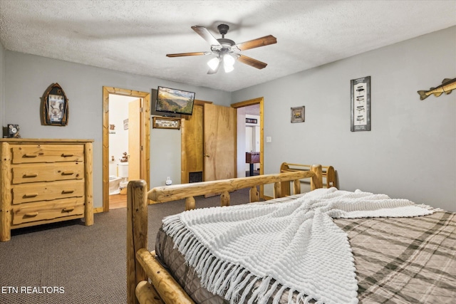 1640 Bench Mountain Way, Sevierville, TN 37862 - bedroom with carpet flooring, a ceiling fan, a textured ceiling, and ensuite bath