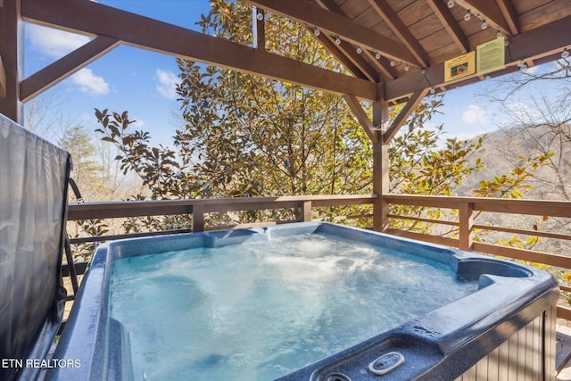 2409 Walnut Cove Way, Sevierville, TN 37862 - wooden terrace featuring a hot tub and area for grilling