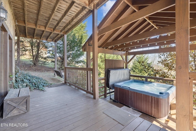 2409 Walnut Cove Way, Sevierville, TN 37862 - wooden terrace with a hot tub