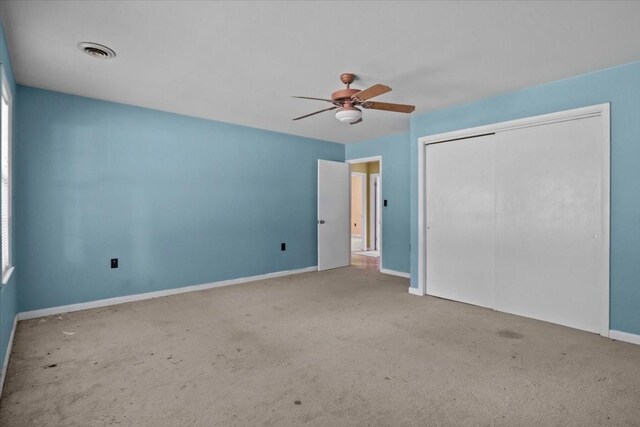 7158 Bahne Rd, Fairview, TN 37062 - unfurnished bedroom featuring carpet floors, a closet, baseboards, and ceiling fan