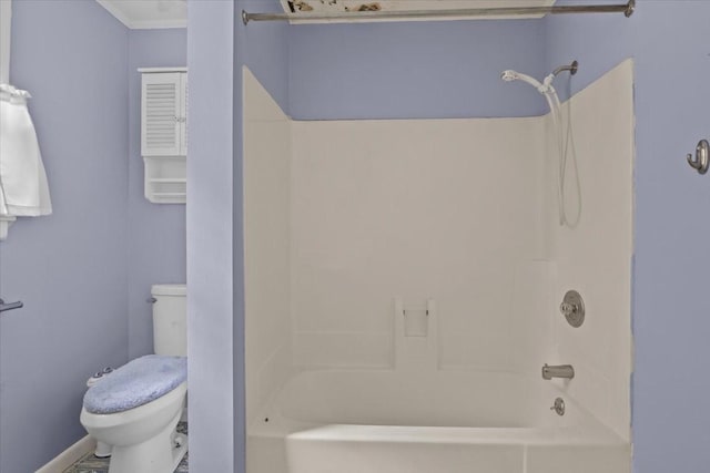 7158 Bahne Rd, Fairview, TN 37062 - bathroom with toilet, shower / bathtub combination, and crown molding
