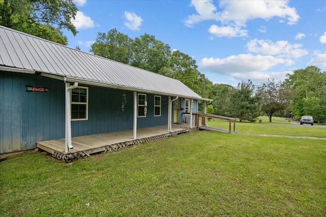 7158 Bahne Rd, Fairview, TN 37062 - view of side of home with metal roof and a lawn