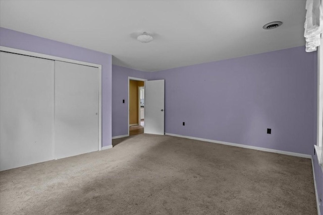 7158 Bahne Rd, Fairview, TN 37062 - unfurnished bedroom featuring carpet floors, a closet, and baseboards